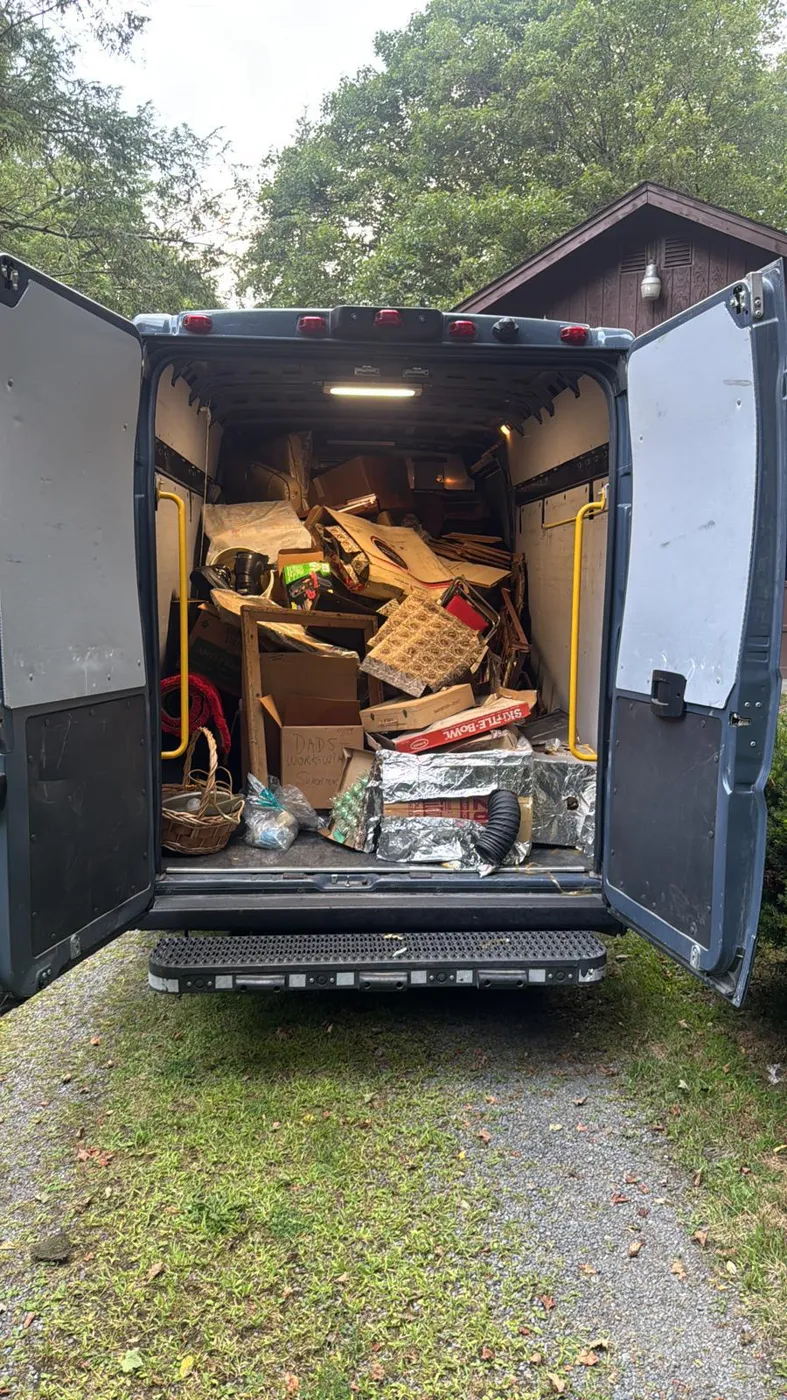 Loaded junk removal van